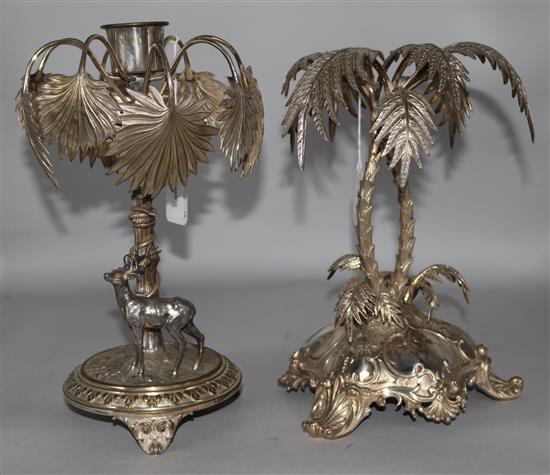 A plated palm tree candlestick and a similar plated centrepiece